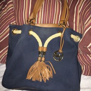 washed navy blue Michael Kors Purse price firm